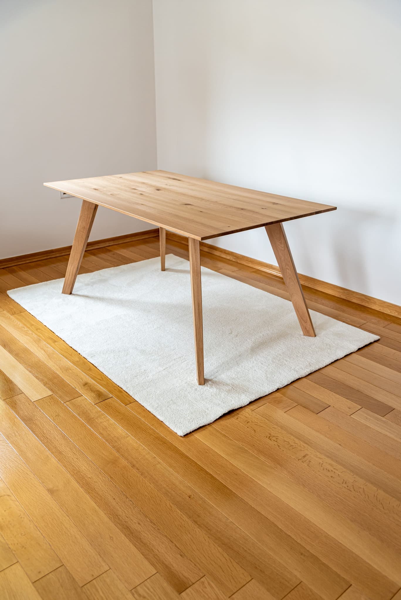 Thin wooden table in the room