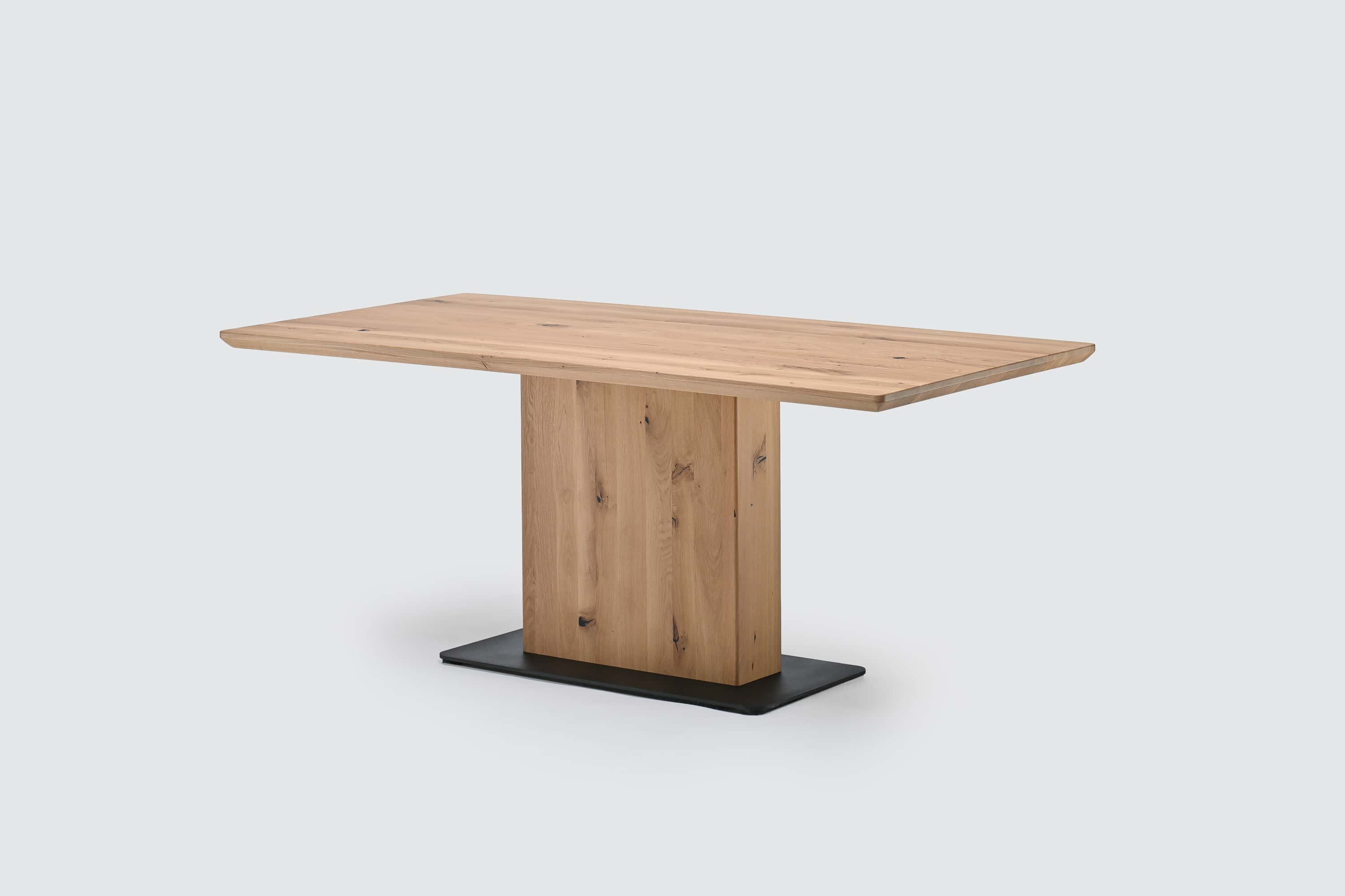 MIAM oak dining table with a central pedestal base